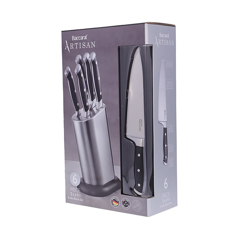 Wooden cutting board with fresh veggies and fruits and sleek black knives - Baccarat Artisan Stahl