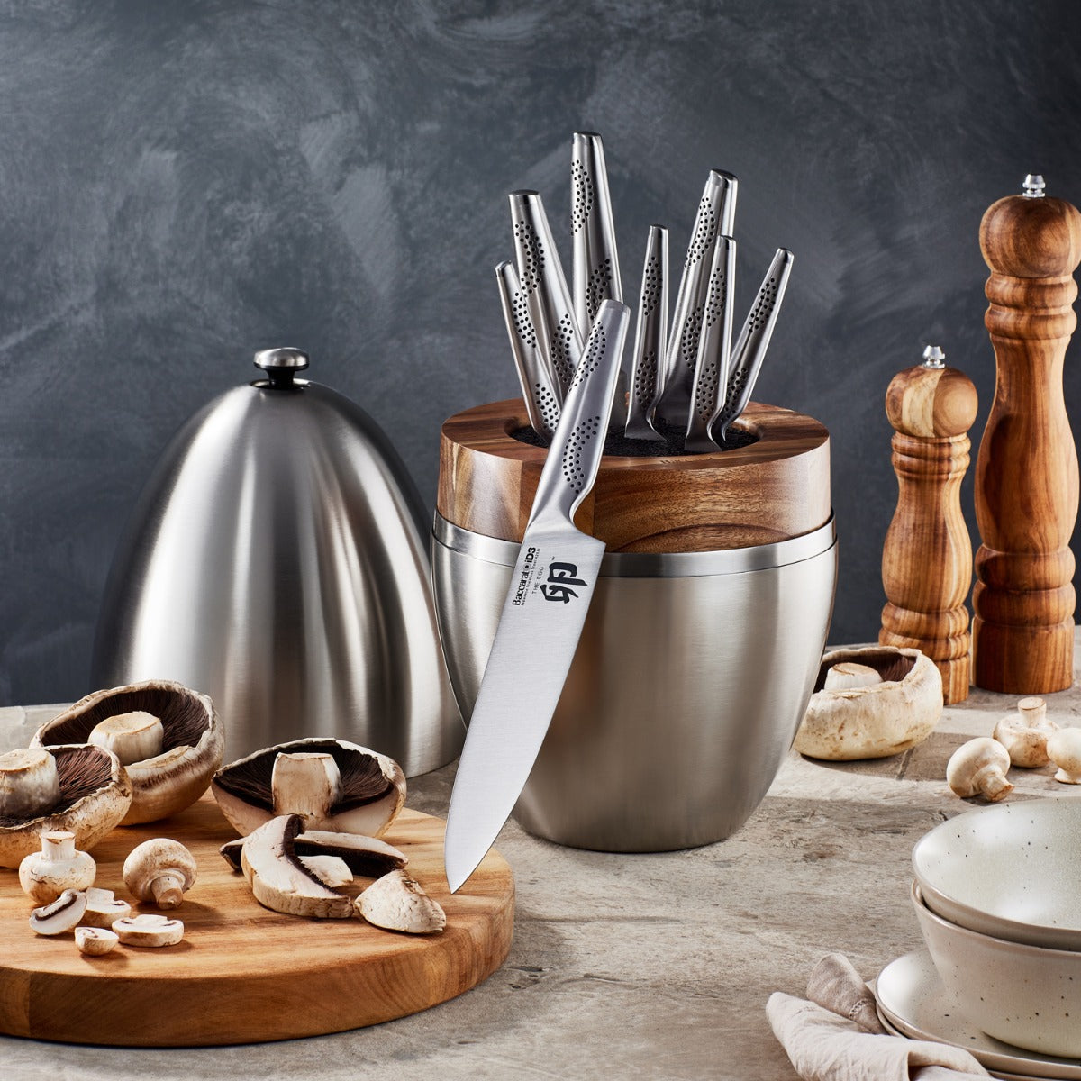 Nine piece stainless steel knife block with wooden accents mushrooms and silver details - Baccarat