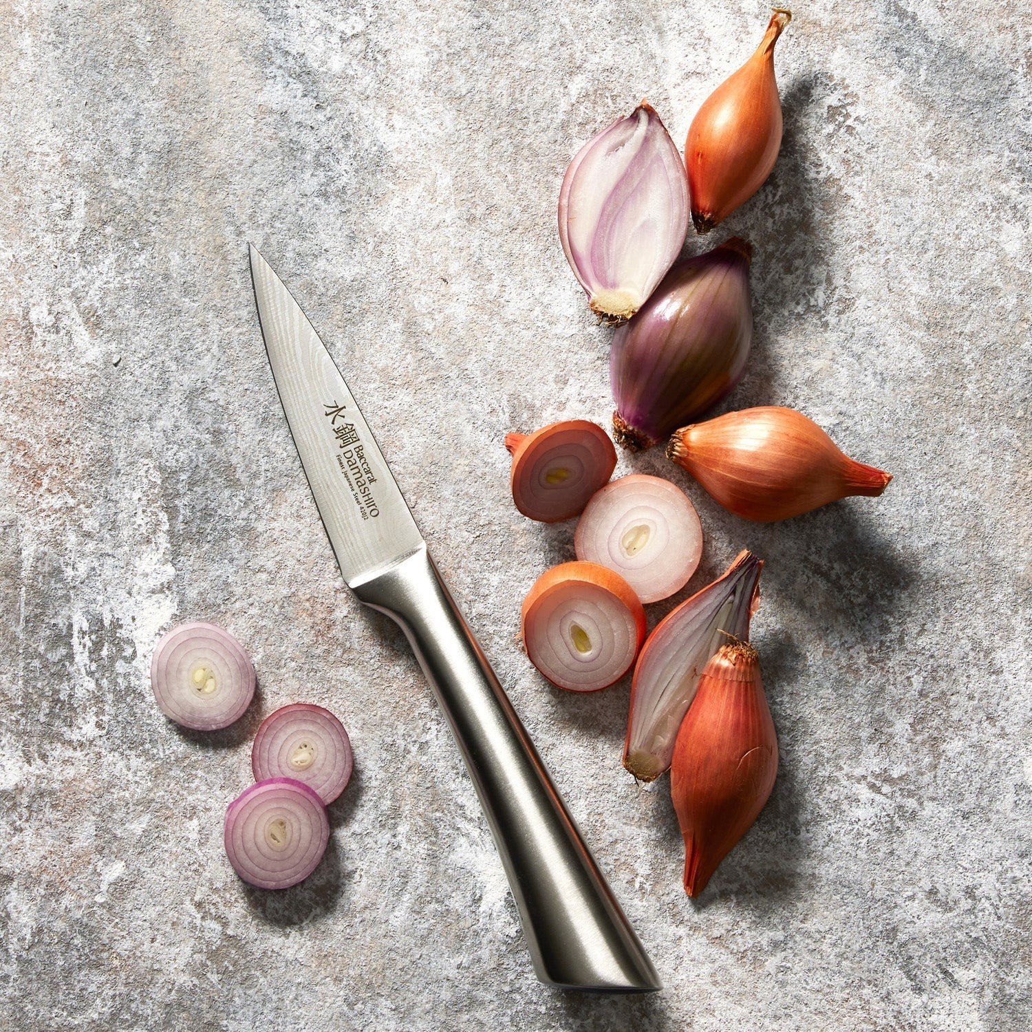 Utility knife with a sharp blade and ergonomic handle in sleek silver finish - Baccarat damashiro