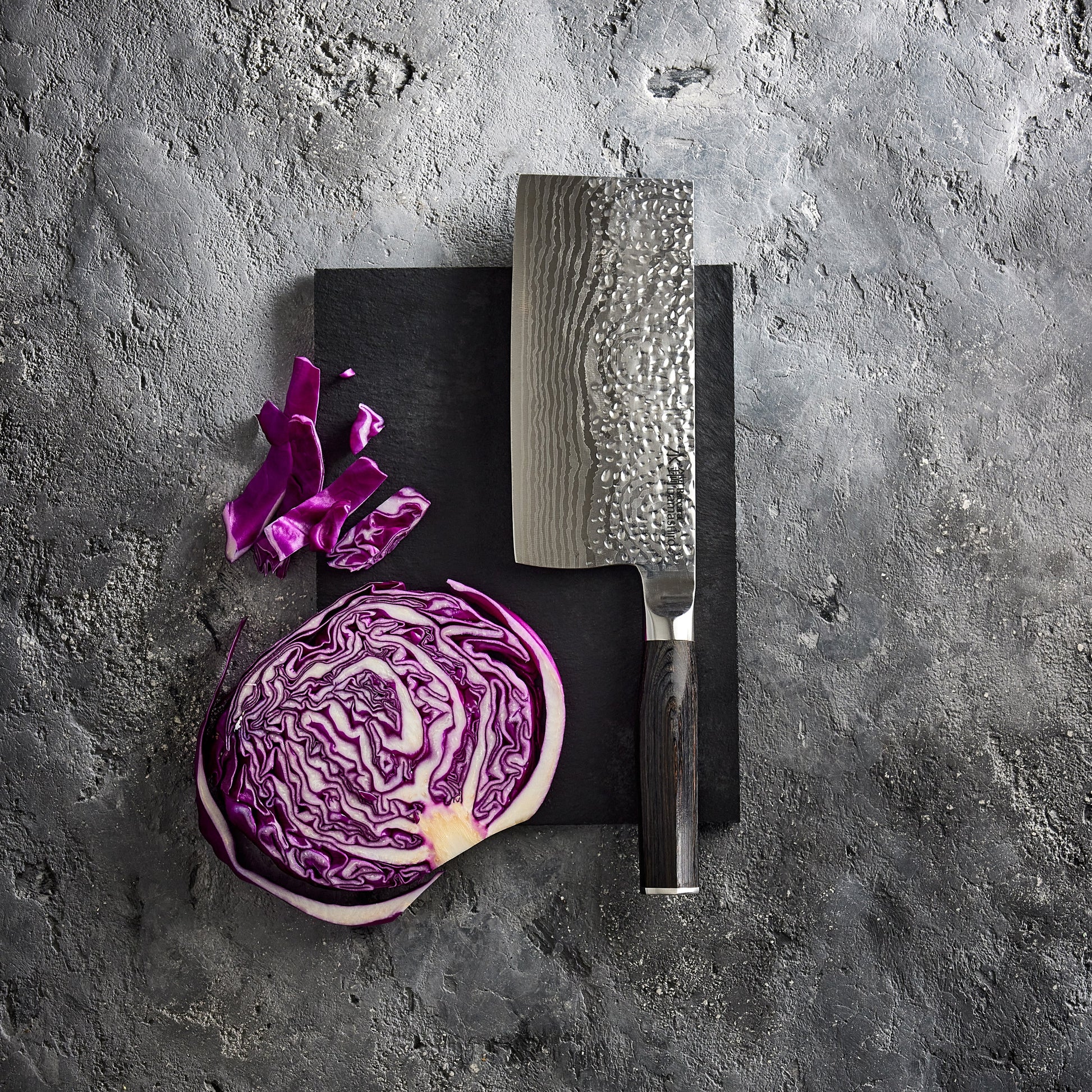 A finely crafted cleaver with a sharp blade and elegant handle design - Baccarat damashiro emperor