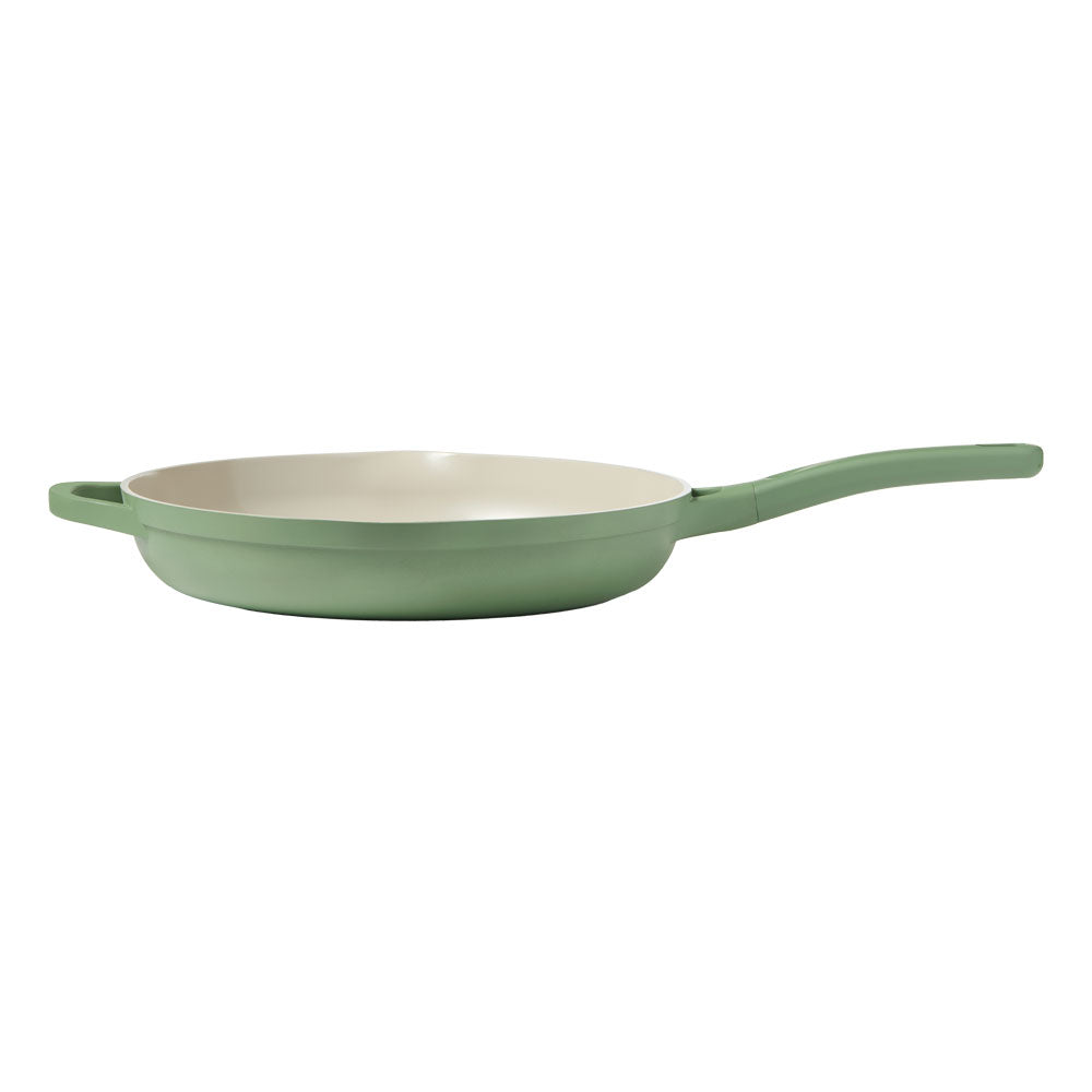 Sage frying pan with long handle is on a white background