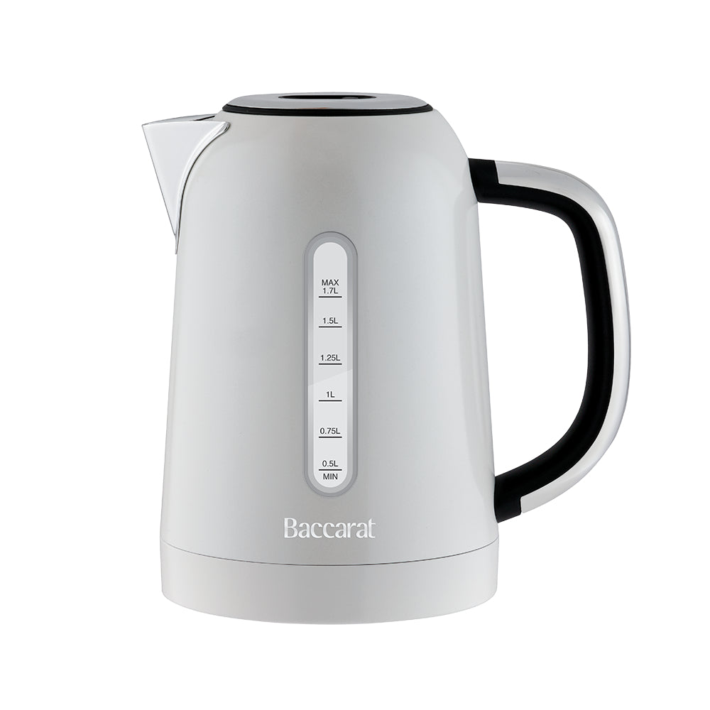 A Baccarat electric kettle in white with a black handle and a chrome-accented spout, shown on a solid white background.
