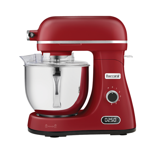 Red stand mixer with clear mixing bowl on a white background