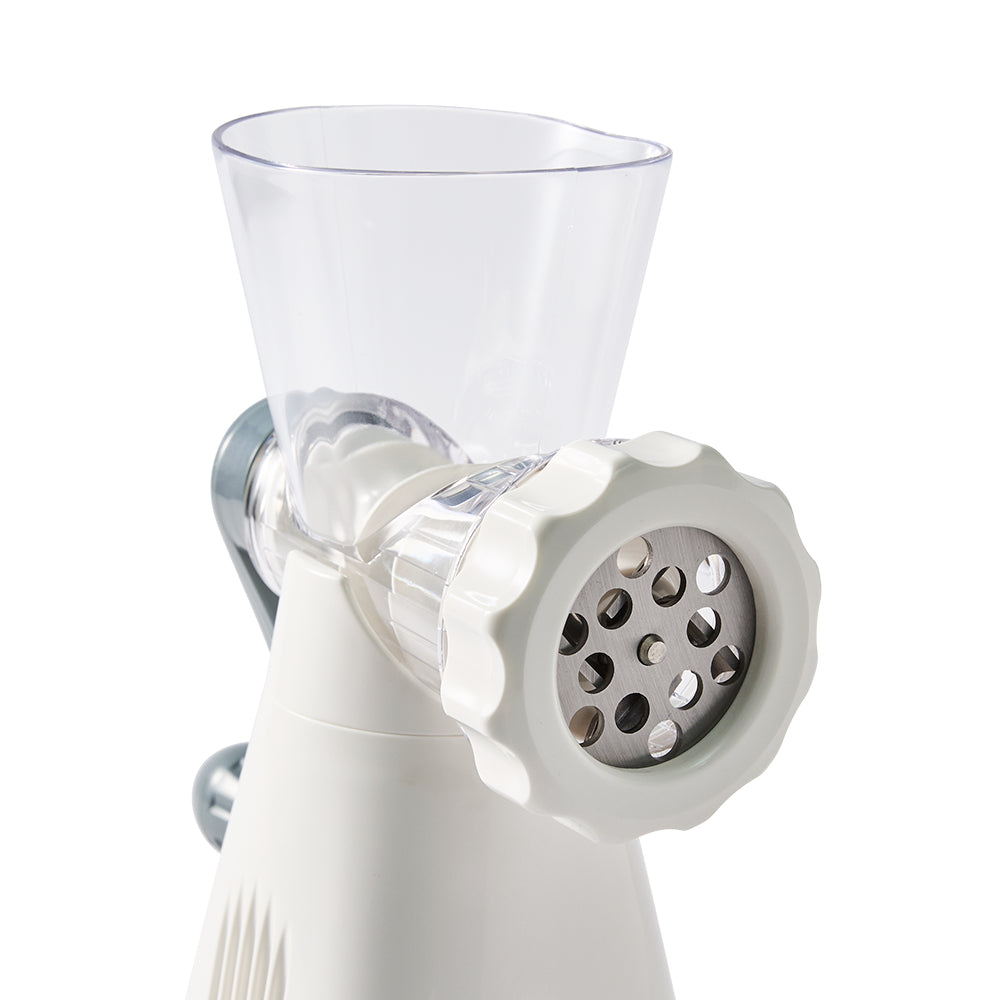 A close-up front view of the Baccarat Prepare Fine & Coarse Meat Mincer is showing the coarse metal mincing disc against a plain white background.