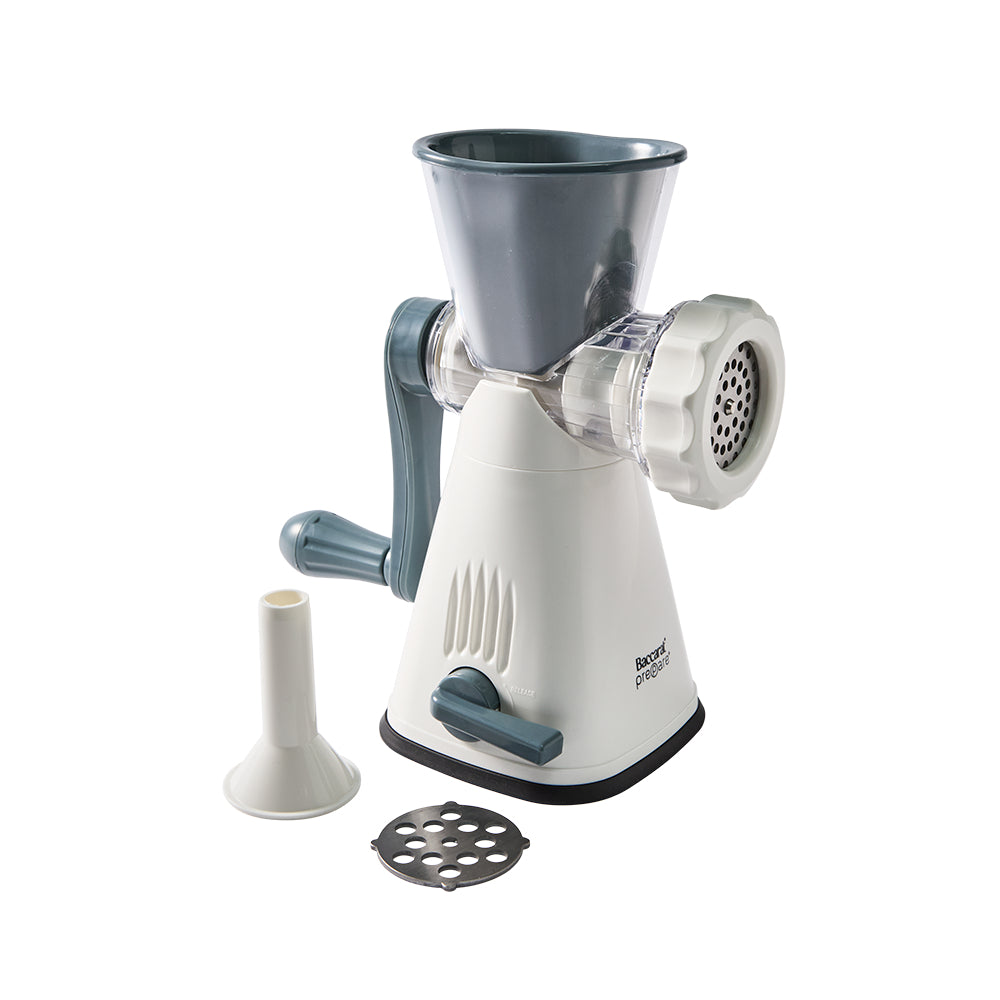 Manual meat grinder with attachments on a white background