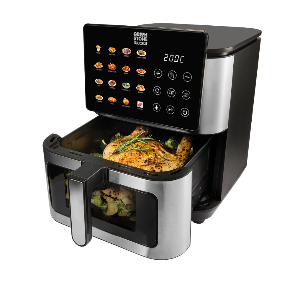 Green Stone Recipe air fryer in black and stainless steel, shown with the drawer pulled open and cooked chicken and broccoli inside, on a white background.