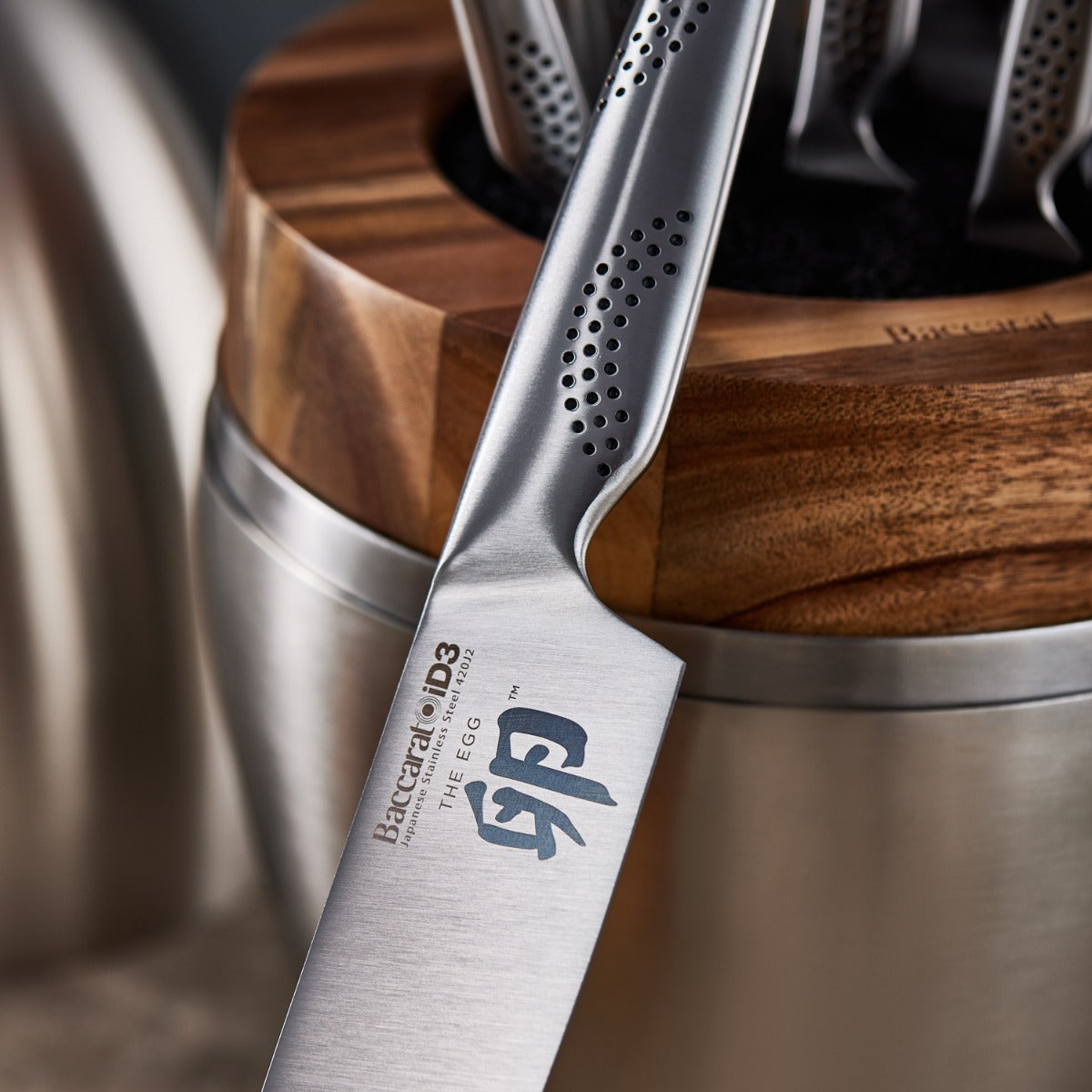 Nine piece stainless steel knife block with wooden accents mushrooms and silver details - Baccarat