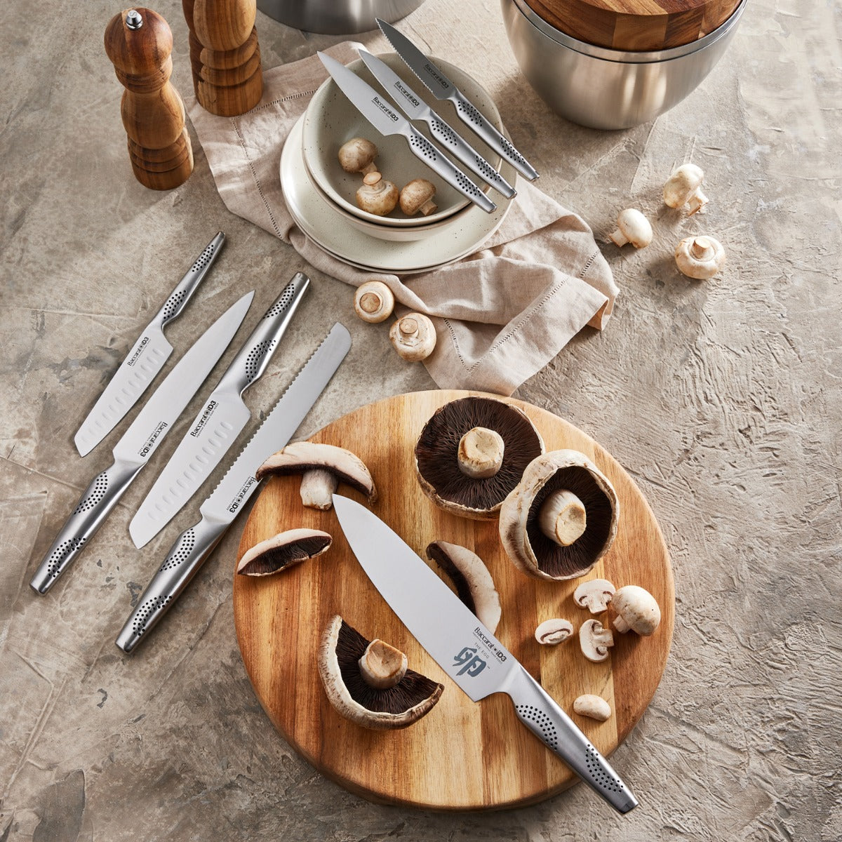 Nine piece stainless steel knife block with wooden accents mushrooms and silver details - Baccarat