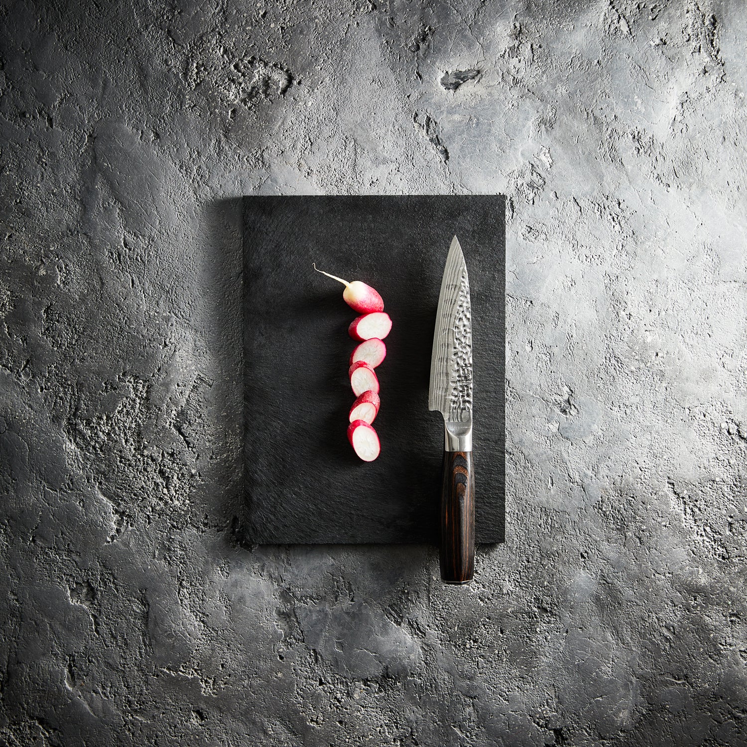 A sleek beautifully crafted carving knife with a fine edge and ergonomic handle - Baccarat Damashiro