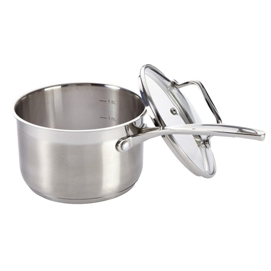 A pot on the stove filled with pasta and utensils nearby silver saucepan with lid 16cm - Baccarat