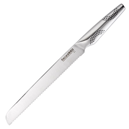 A sleek serrated bread knife is positioned on a wooden cutting board next to fresh bread - Baccarat