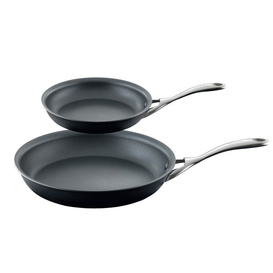 Two hard anodised non stick frying pans with vibrant tomatoes and peppers - Baccarat
