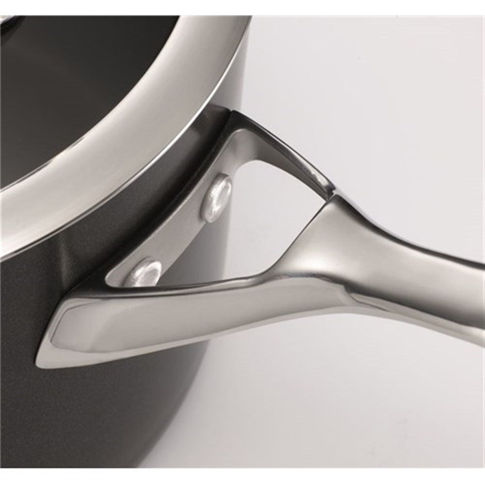 A durable crepe pan with a smooth cooking surface and ergonomic handle - Baccarat