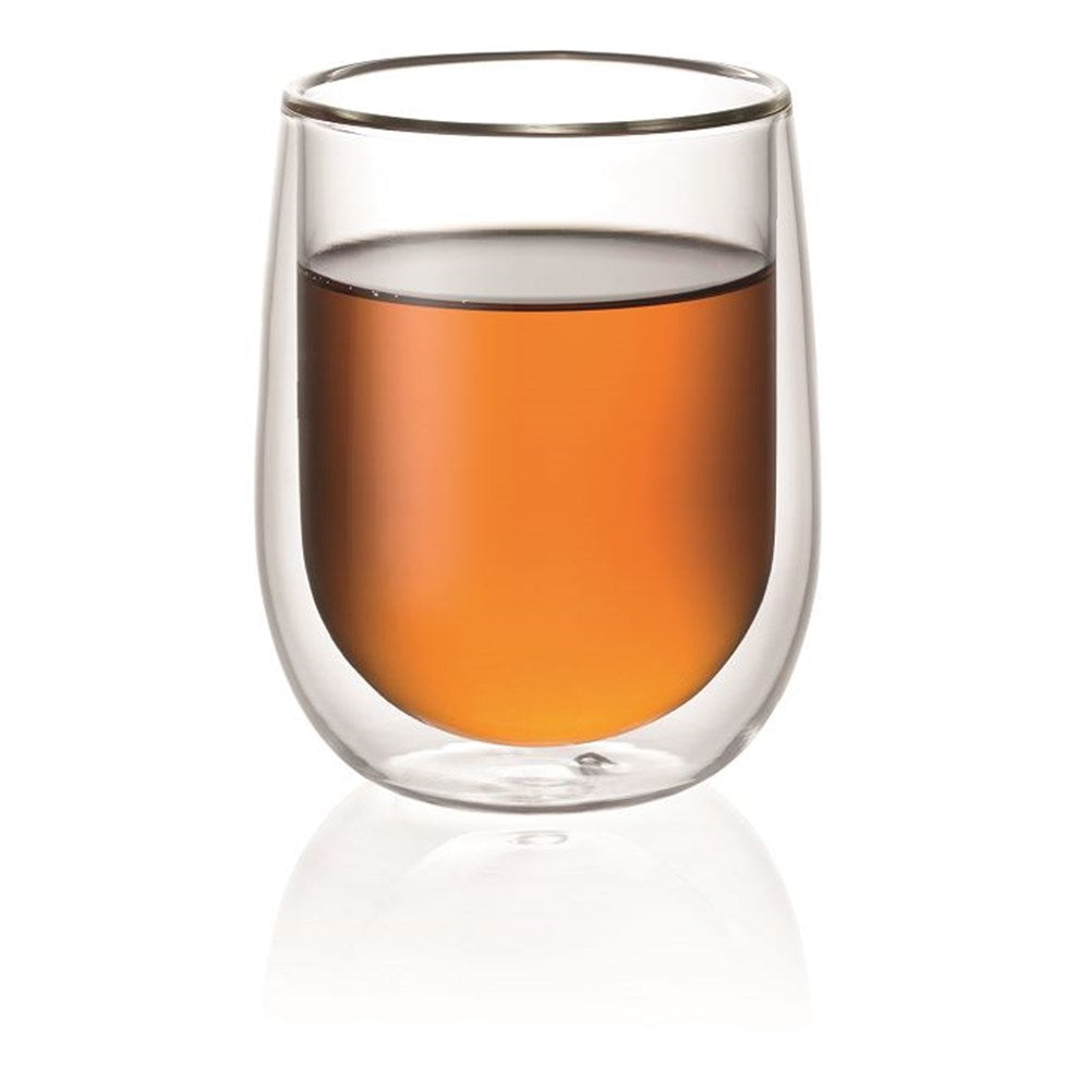 Salt keeper on a rustic beige plate with brown sugar cubes and iced coffee - Baccarat spice market