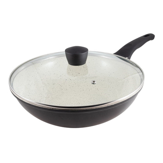 Stir frying colourful vegetables in a black ceramic pan with a glass lid - Baccarat ceramix stirfry