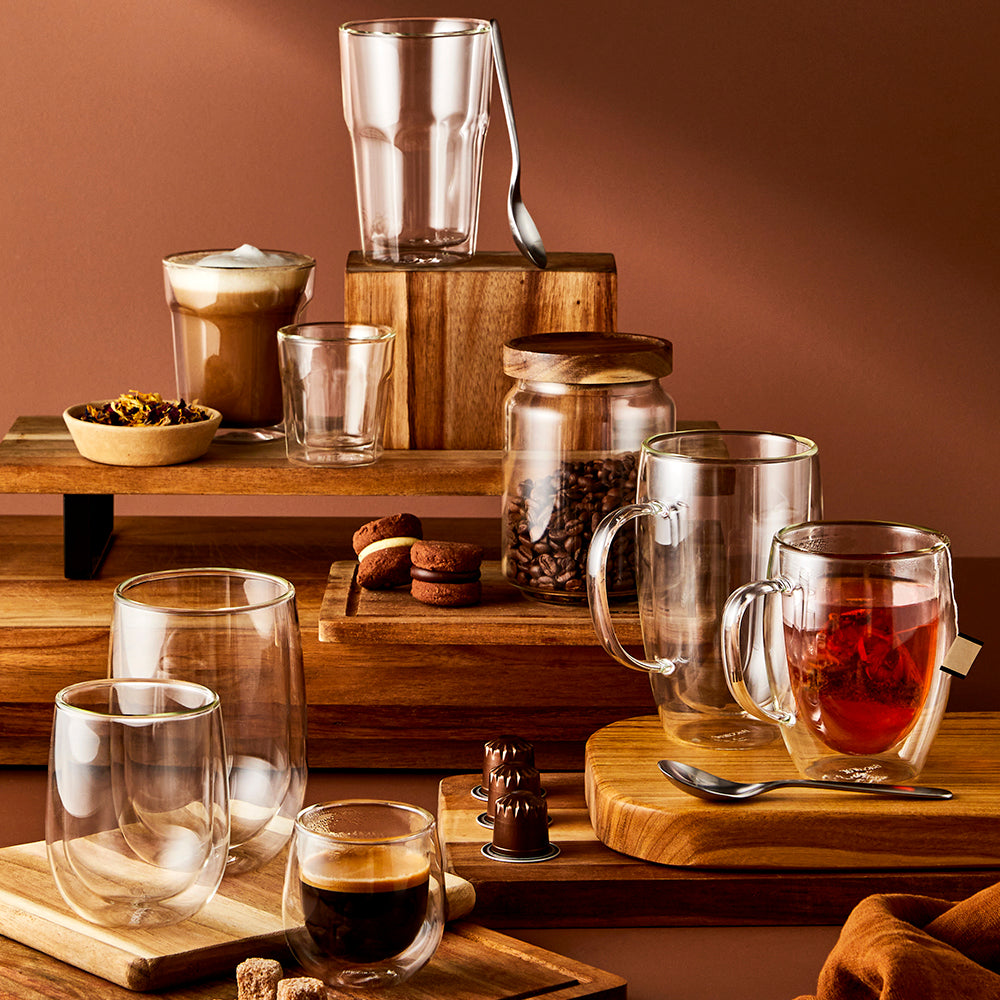 A santoku knife set displayed with a wooden board coffee beans earthy tones - Baccarat damashiro