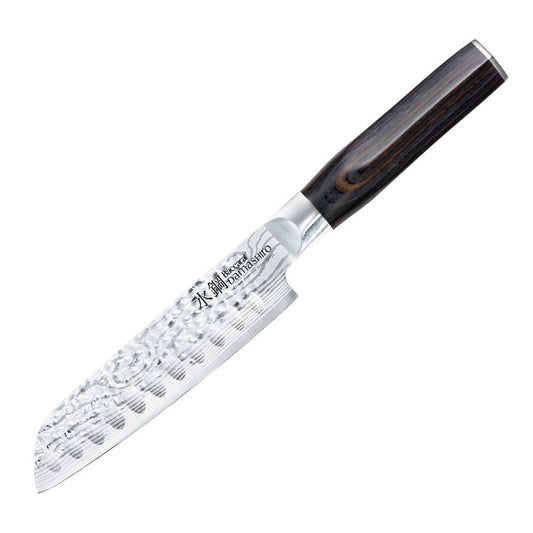 Diced mango on a dark cutting board with a sharp santoku knife - Baccarat damashiro emperor try me