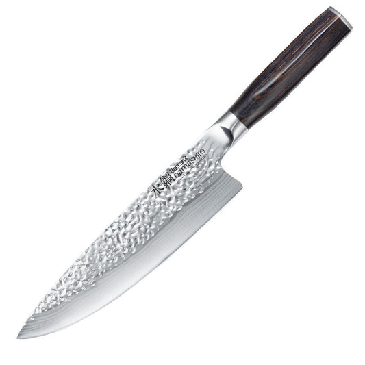 Sliced red peppers on a stone board with a sharp knife - Baccarat damashiro emperor chefs knife 20cm
