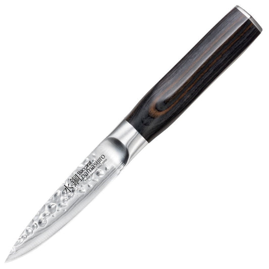 Chopped green herbs on a dark cutting board with a sleek silver knife - Baccarat Damashiro Emperor