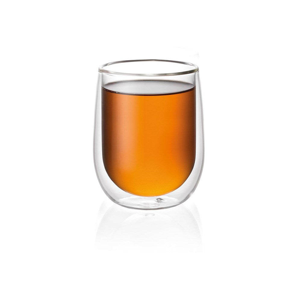 Dalgona coffee in double wall glass with empty glasses and sugar cubes - Baccarat Barista Cafe