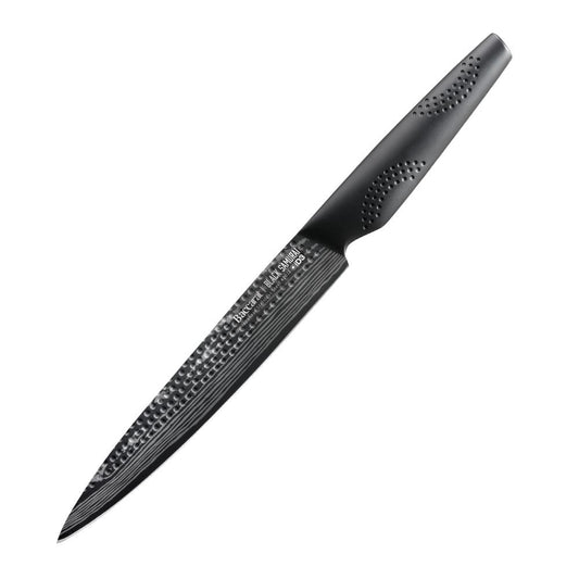 A sharp chef's knife with a black blade and textured handle perfect for precision cutting - Baccarat