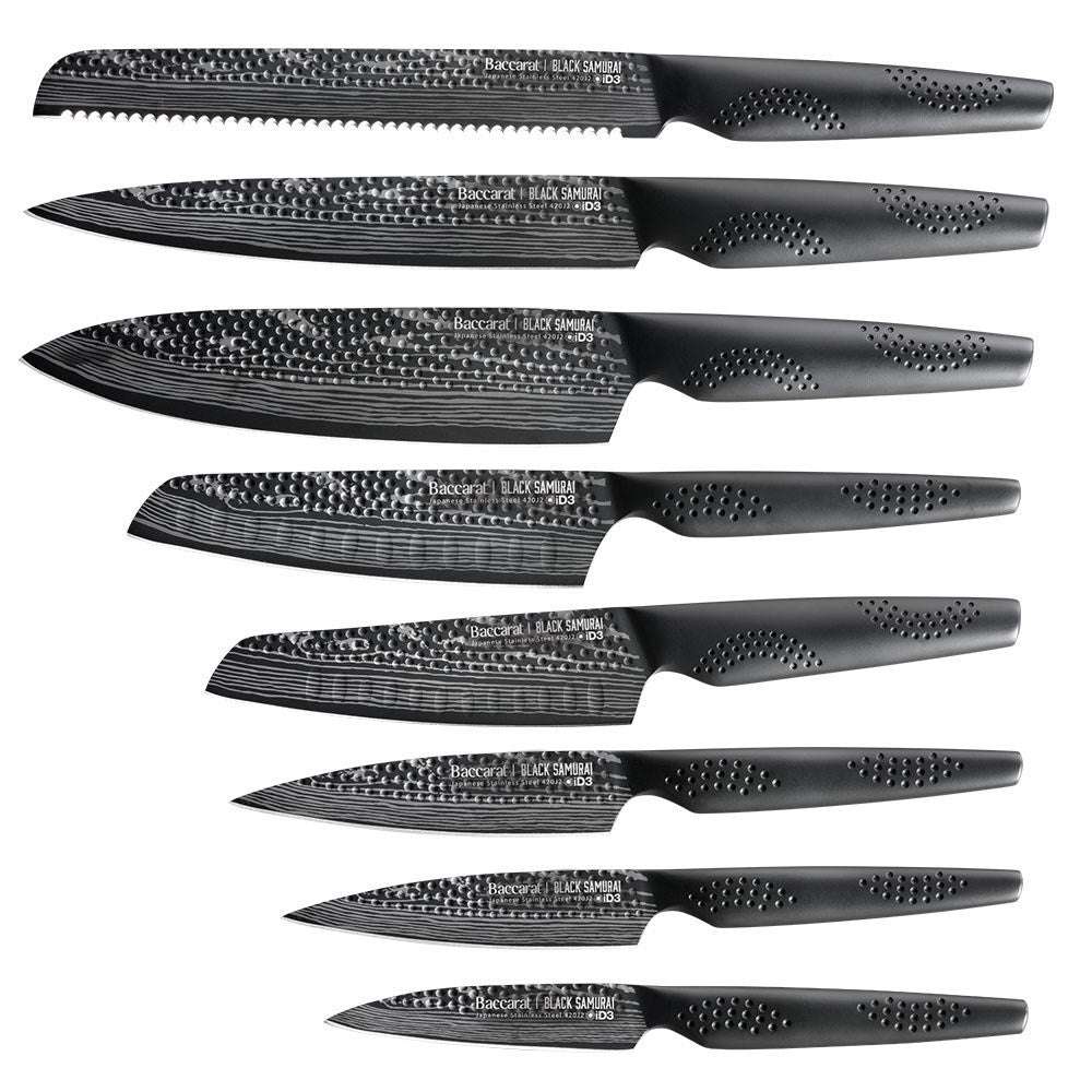 A top-angle view of sleek black knives with precision blades arranged vertically - Baccarat Samurai