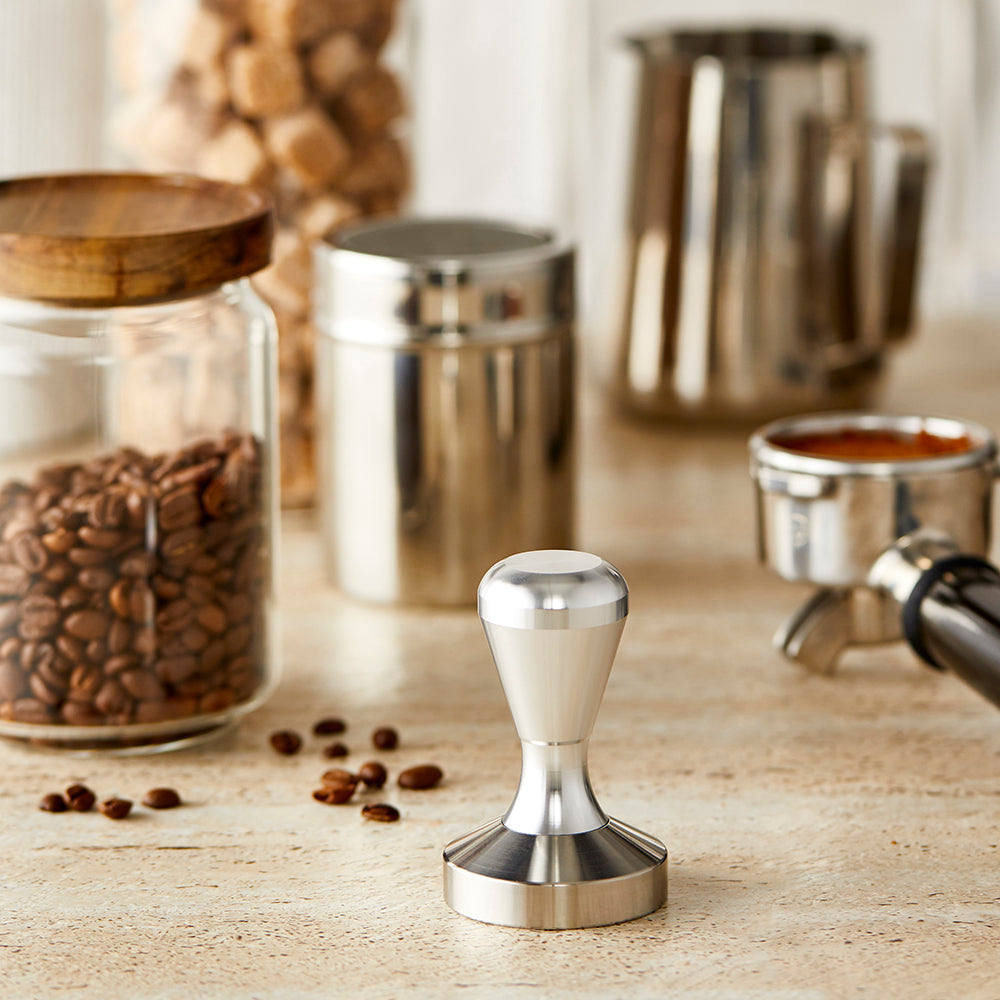 Baccarat artisan knife block on a wooden countertop with jars and a portafilter nearby - Baccarat