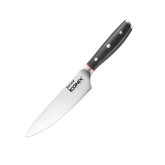 Black-handled chef's knife with red accents on a textured surface 15cm mini chef knife - Baccarat