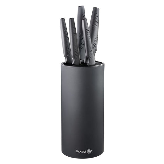 Stylish knife block with six sleek knives and vibrant apples in the background - Baccarat id3 kuro