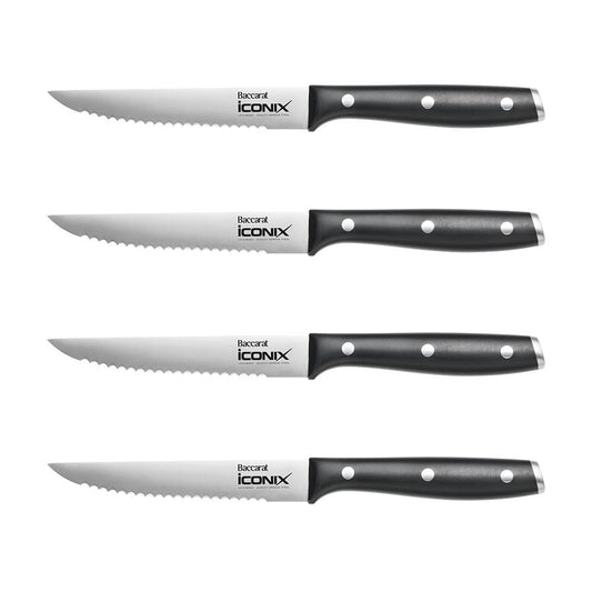Four stainless steel utility knives aligned horizontally black handles - Baccarat wolfgang starke