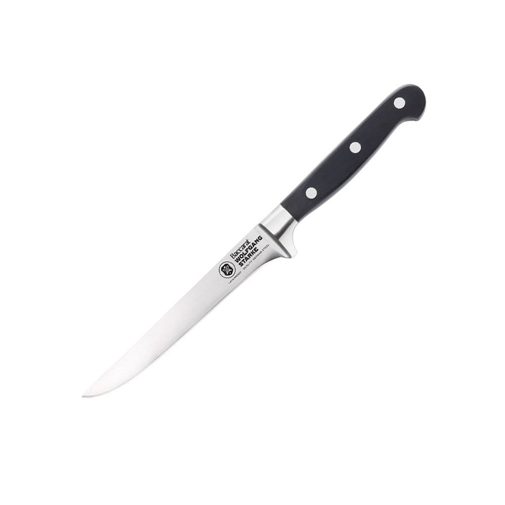 Wolfgang Starke stainless boning knife surrounded by figs and herbs on a grey surface - Baccarat 