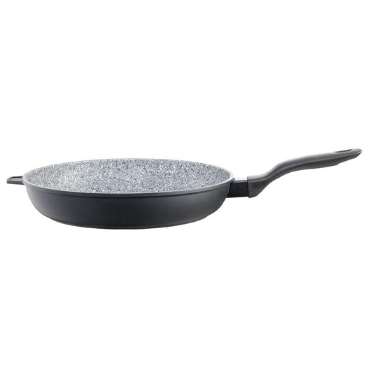 Frying pan with green peas on black surface wooden board with broccoli and onions nearby - Baccarat