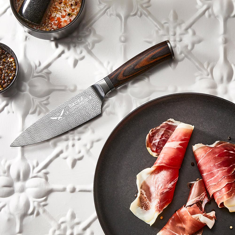 Sleek chefs knife with wooden handle in a silver box with French flag logo - Baccarat Le Connoisseur