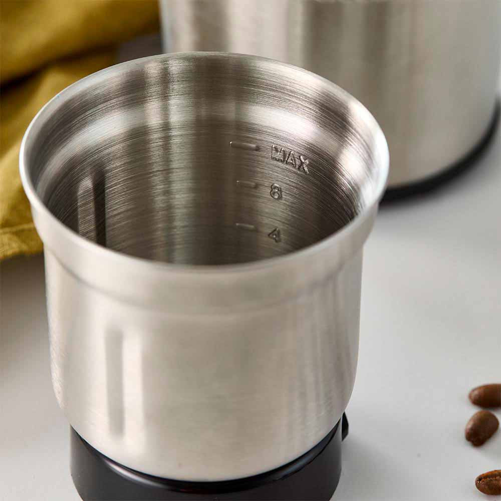 Flavour maker coffee spice grinder in stainless steel with spices on a wooden board - Baccarat