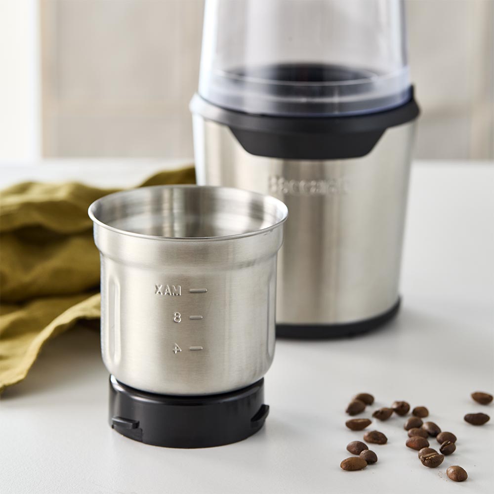 Flavour maker coffee spice grinder in stainless steel with spices on a wooden board - Baccarat