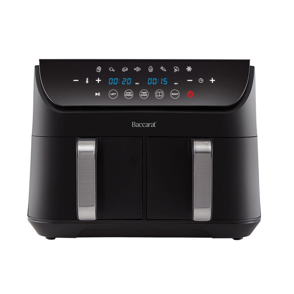 Close-up of a sleek black loaf bread maker with removable baskets and cooked potatoes - Baccarat