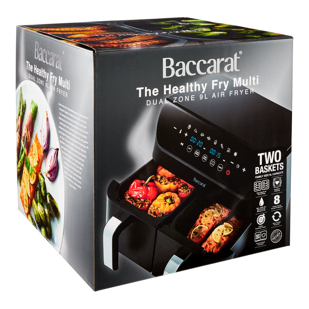 Close-up of a sleek black loaf bread maker with removable baskets and cooked potatoes - Baccarat