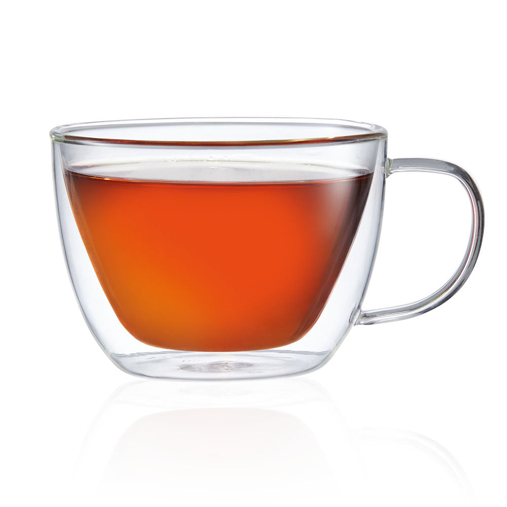 A glass cup filled with dark amber tea transparent beverage container - Baccarat barista brillante