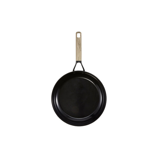 Pancakes in skillet next to syrup topped pancakes on plate non stick frypan 24cm - Baccarat