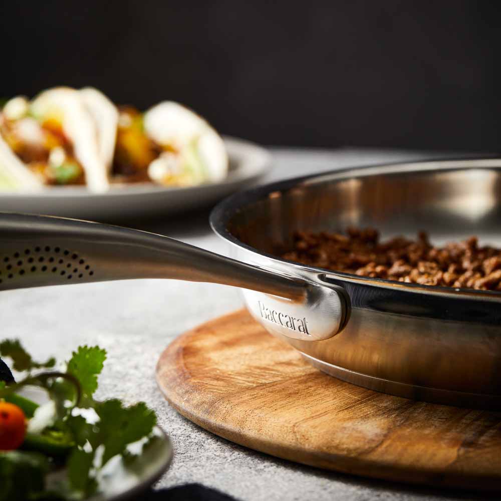 Baccarat id3 Stainless Steel 30cm Frypan with cooked ground beef on a table with tacos and salad
