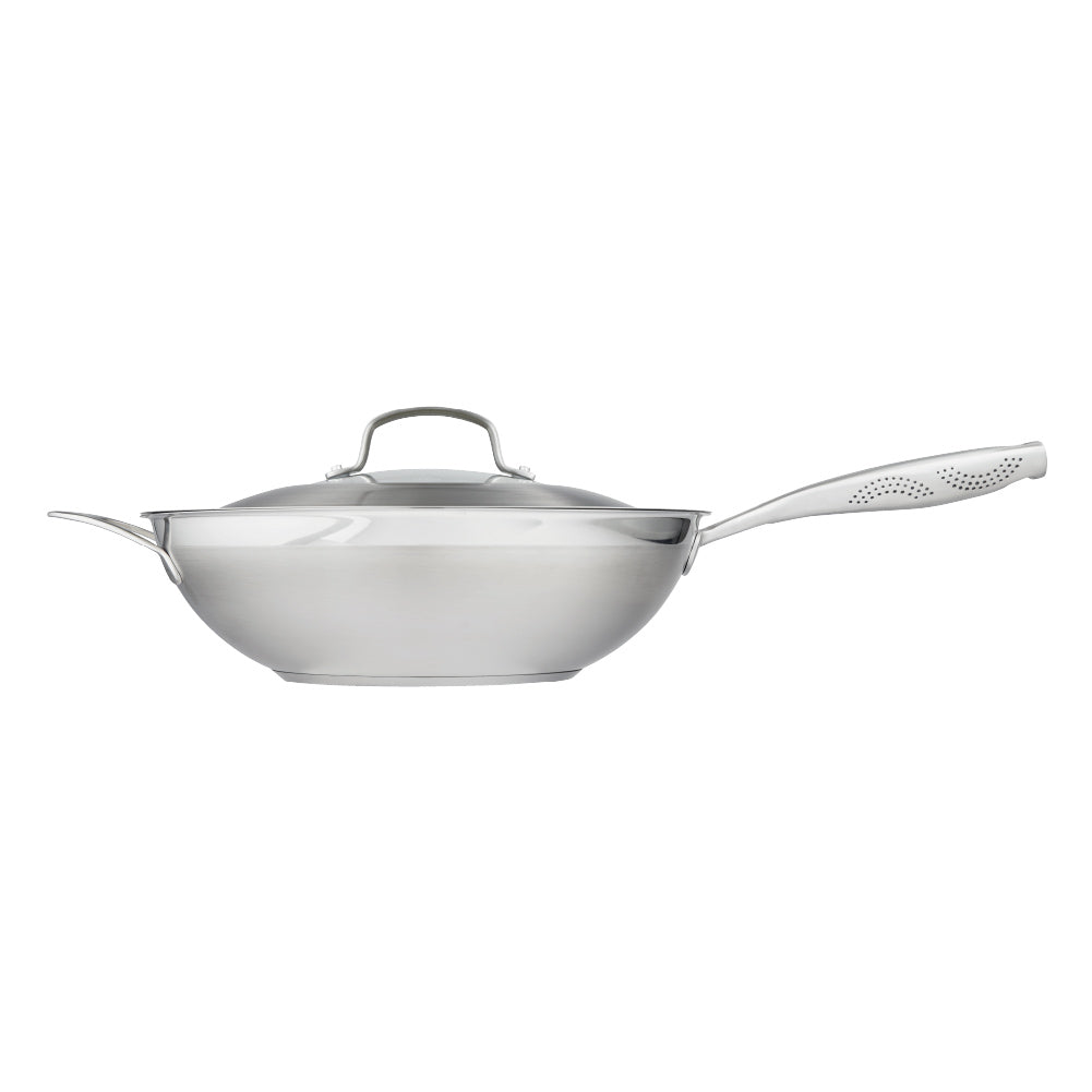 Person serving gourmet pasta from a black bowl - Baccarat id3 stainless steel chef pan with lid 32cm