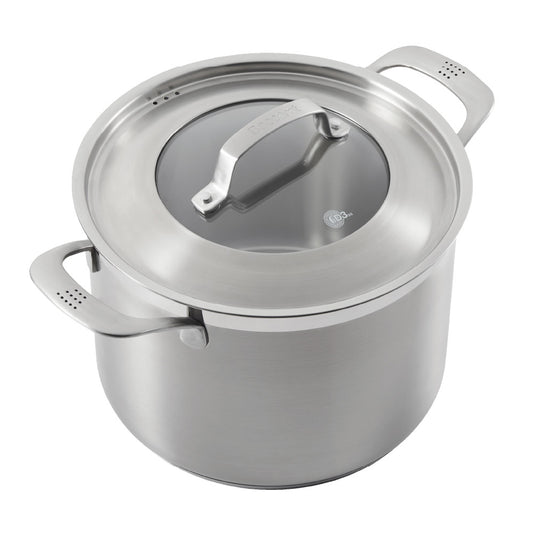Close-up of a stainless steel pot lid with a handle and steam holes modern cookware 24cm - Baccarat