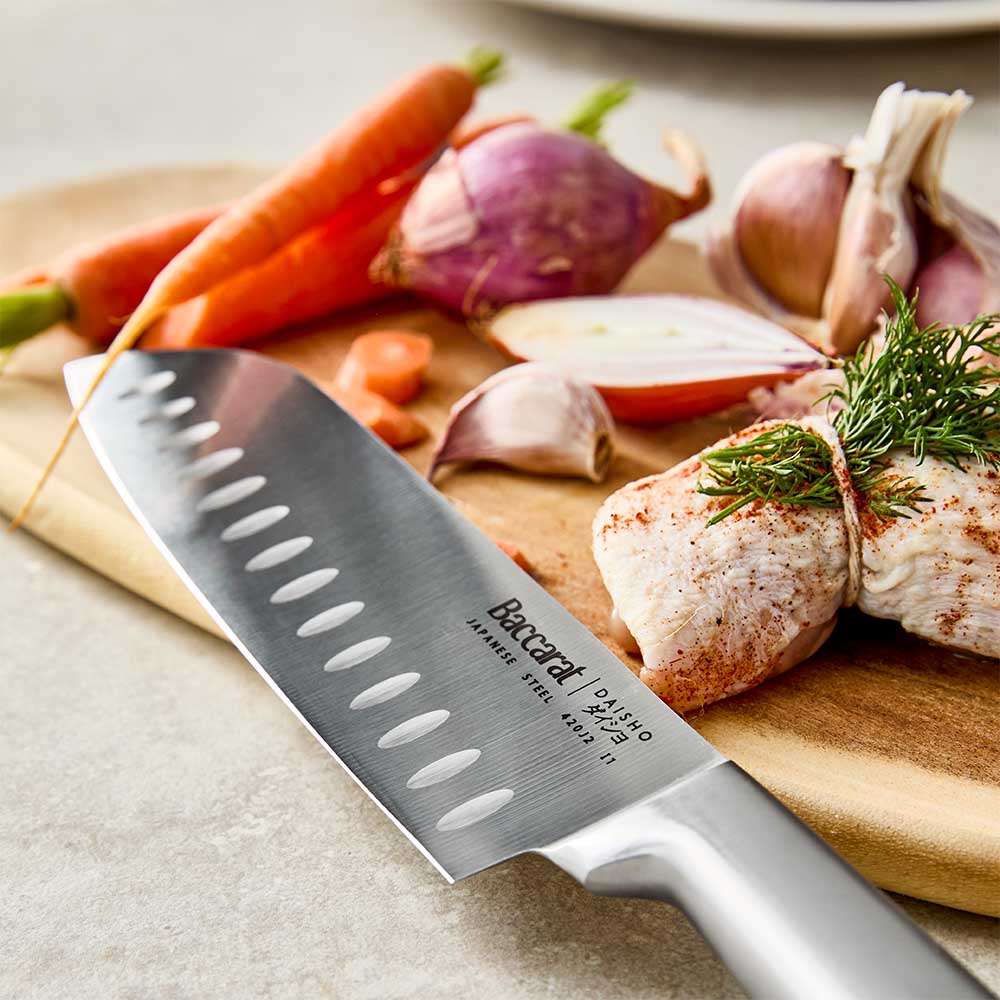 close of a japanese steel santoku knife