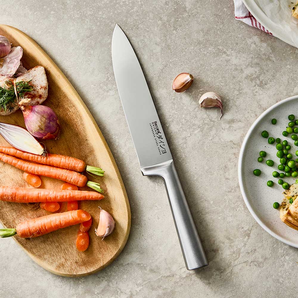 flat lay of a hefs knie next to a chopping board of vegetables