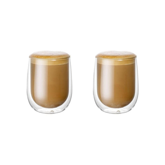 Salt keeper on a rustic beige plate with brown sugar cubes and iced coffee - Baccarat spice market