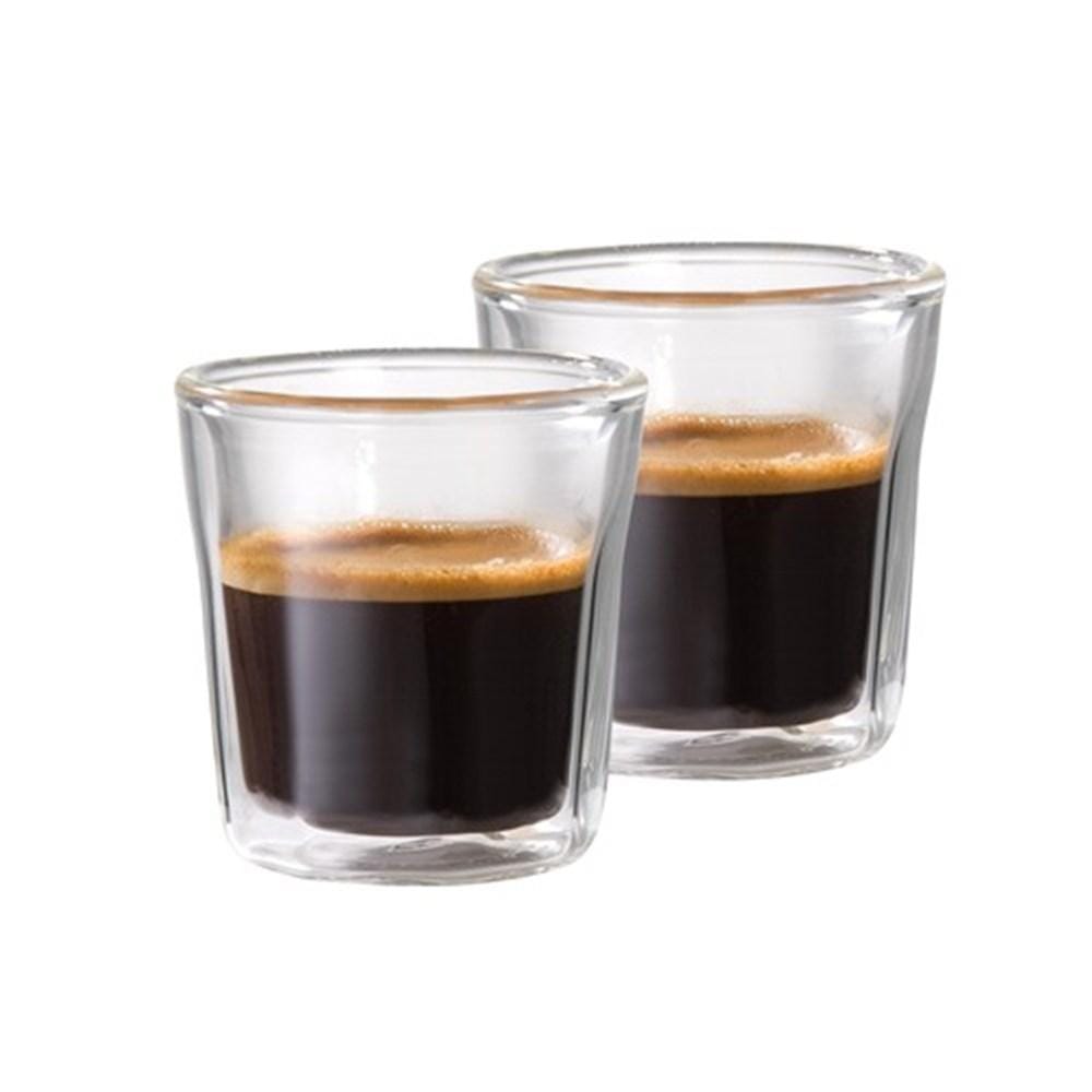 Steaming espresso in double wall glass on wooden board with biscotti - Baccarat Barista Facet