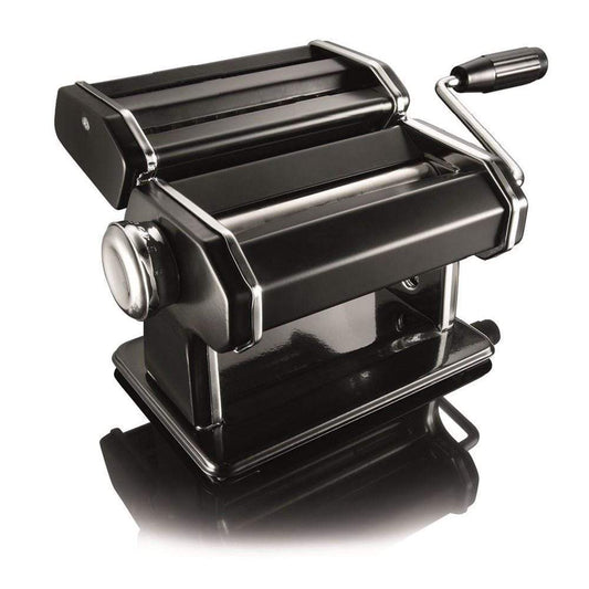 A person creating fresh golden pasta in a cozy kitchen - Baccarat gourmet 150mm pasta machine black
