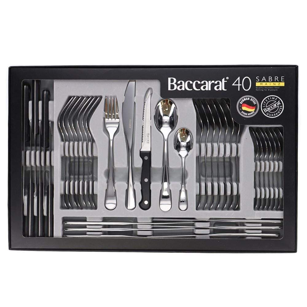 A 40 piece cutlery set gleams on a brown napkin showcasing luxury tableware - Baccarat sabre mainz