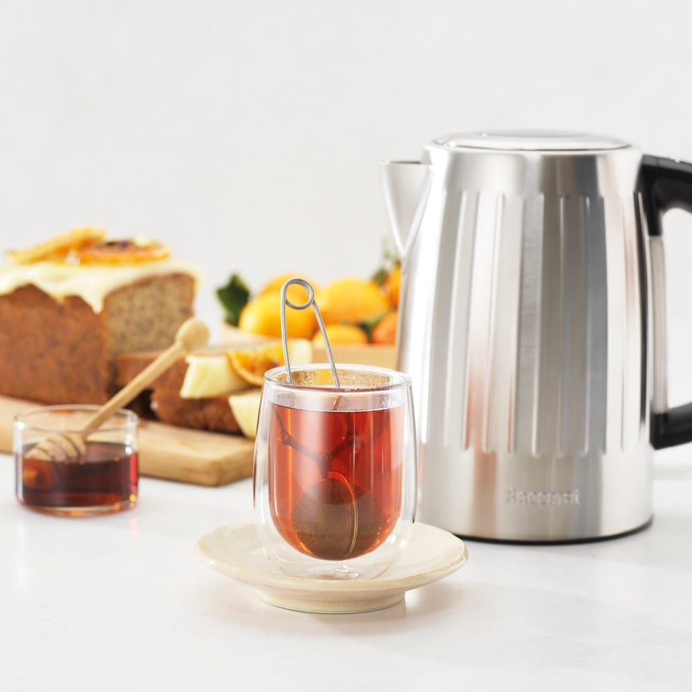 sleek kettle design with a silver finish and black handle - Baccarat the boiling point kettle silver