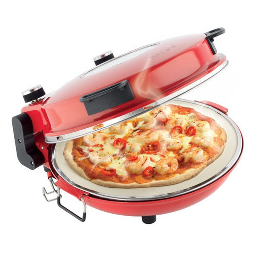 Red gourmet slice pizza oven with temperature dial beside a plant and tomato sauce bottle - Baccarat